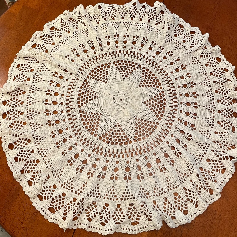 Hand crocheted round table cover